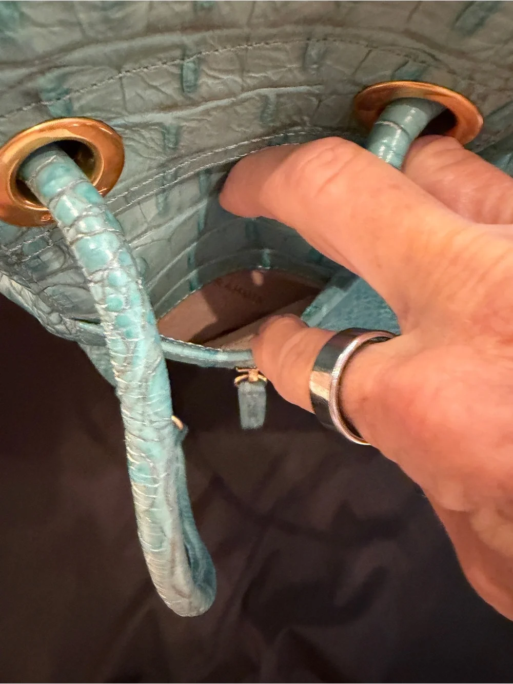 Brahmin Turquoise  very good condition sling backpack. Faux Alligator.
